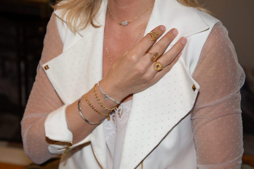 mix and match jewellery on a woman