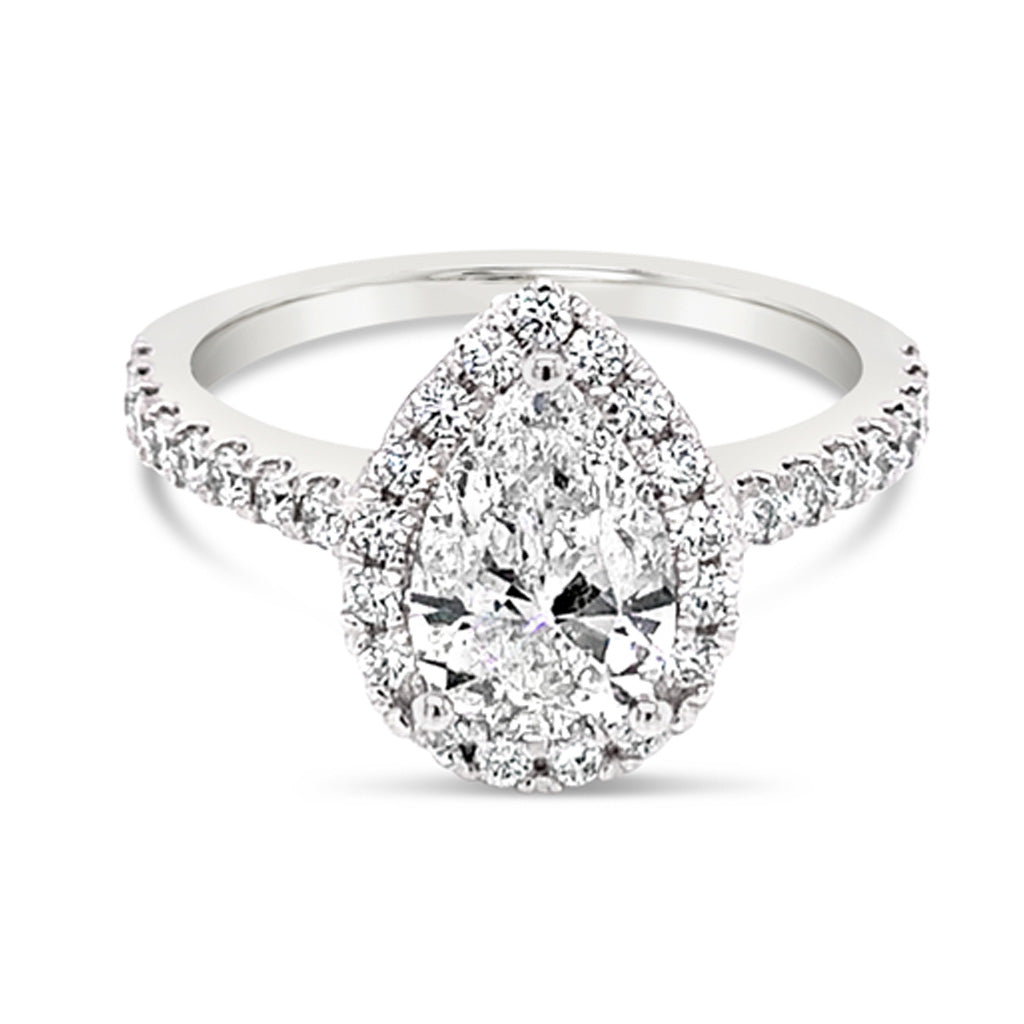 Pear shaped halo diamond on sale ring