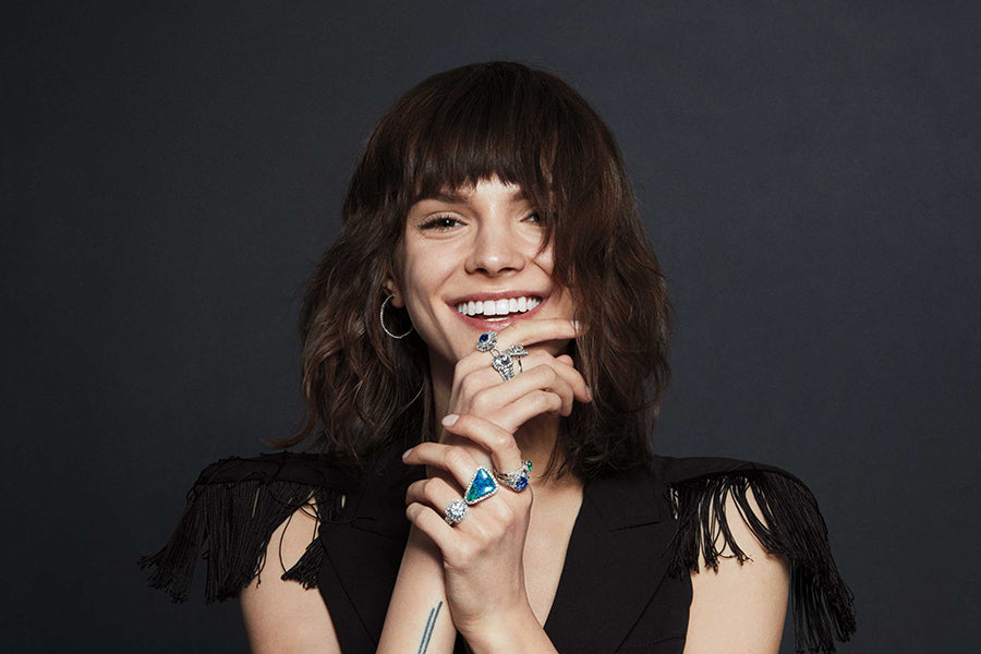 woman smiling wearing jewelry