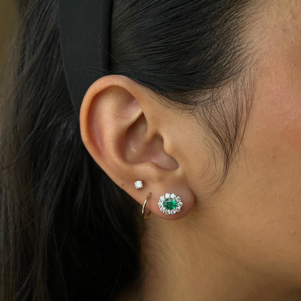 18K White Gold 0.55 CTW Oval Emerald And 0.66 CTW Diamond Stud Earrings