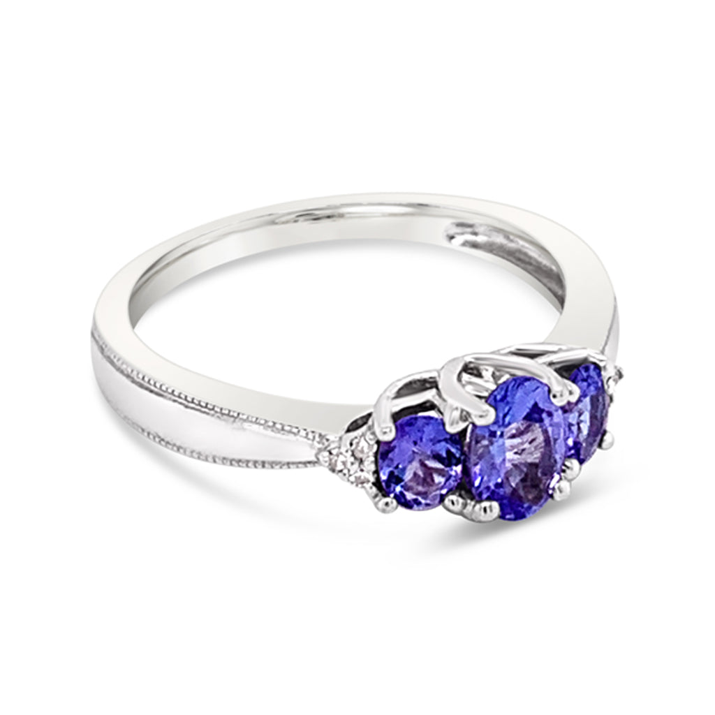 10K White Gold Tanzanite And 0.03 TDW Diamond Women's Ring