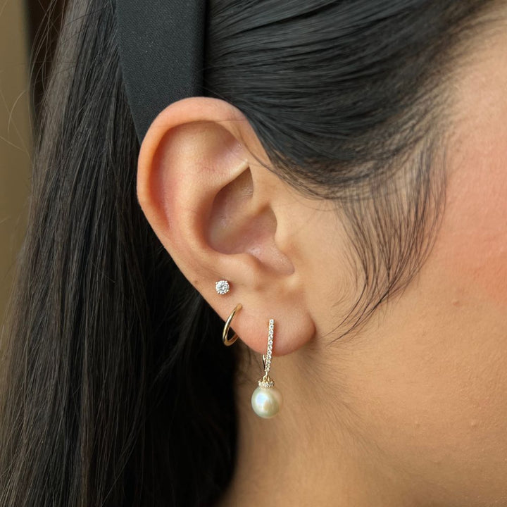 14 Karat Yellow Gold Pearl Dangle Earrings With 0.18 CTW Diamonds